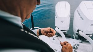 tying knot with mercury v10 in background