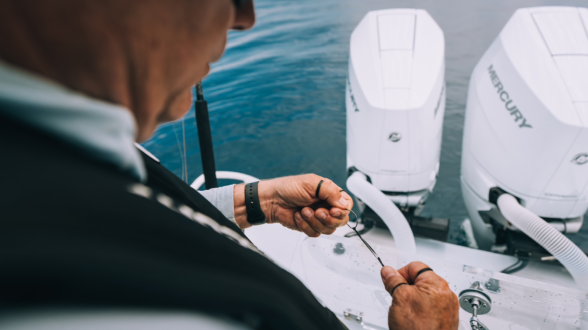 tying knot with mercury v10 in background